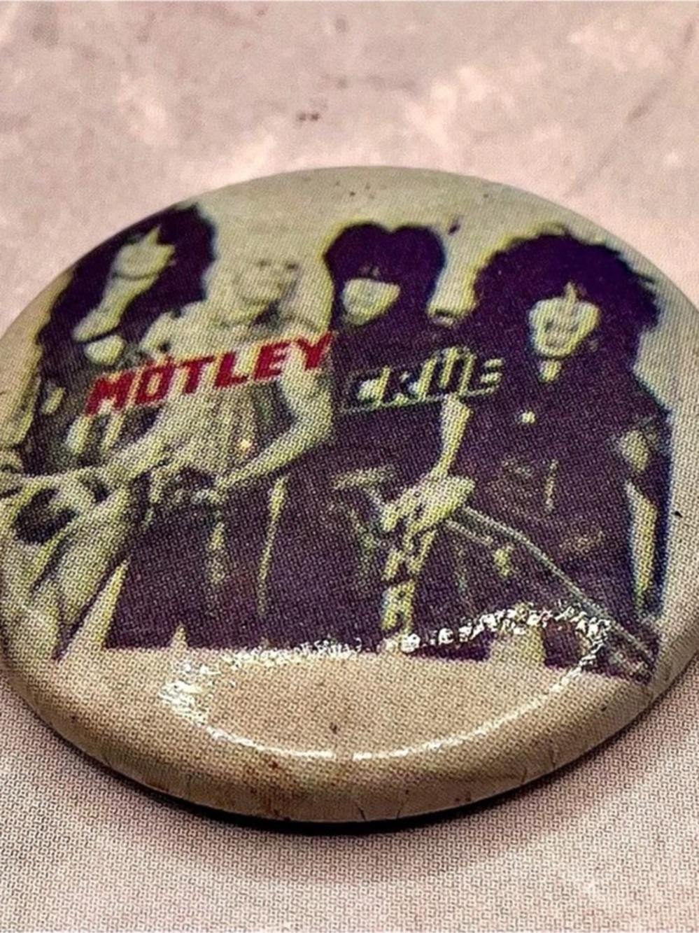 Vintage Motley Crue Music Pin in Beige and black